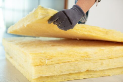 Hand,Holding,An,Insulation,Sheet
