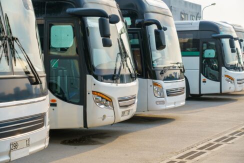 City,Buses,In,The,Parking,Lot,At,The,Bus,Station